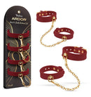Temptasia Ardor Silicone Wrist & Ankle Restraints Red displayed with chains on a black packaging background.
