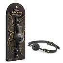 Temptasia Ardor Silicone Ball Gag Black displayed with packaging and adjustable straps, ideal for sensory play and roleplay.