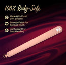 Temptasia Ardor Silicone Slapper Pink on a luxurious background, highlighting its body-safe silicone, lightweight design, and smooth finish.