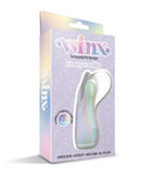 WINX Fancy Flutter Squishy Silicone Vibrator in pastel swirled packaging, showcasing its whimsical design and functionality.