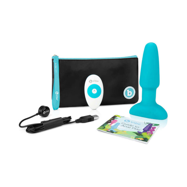 b-Vibe Rimming 2 Rotating and Vibrating Remote Control Plug Teal with accessories, storage pouch, and user guide.