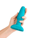 b-Vibe Rimming 2 Rotating and Vibrating Remote Control Plug Teal in hand showcasing its sleek design.