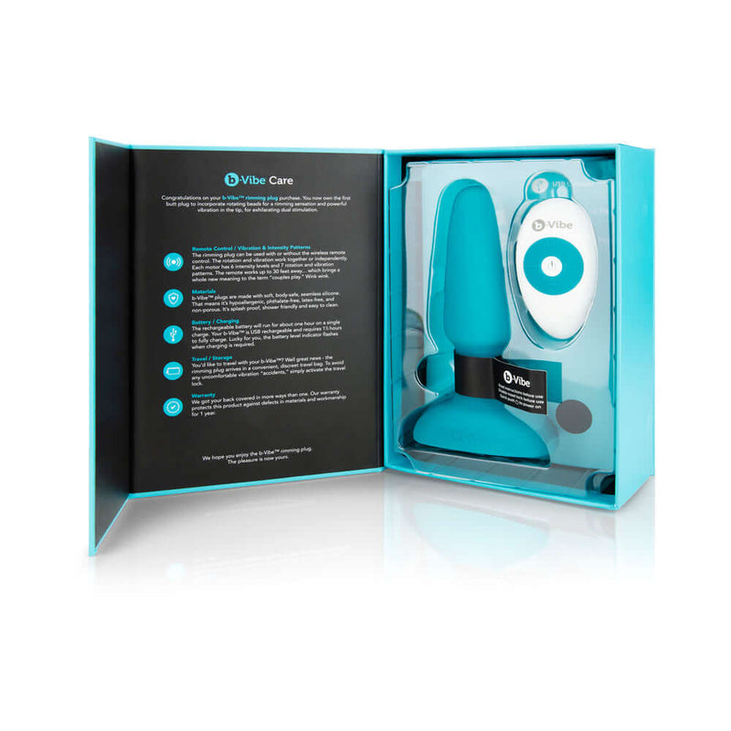 b-Vibe Rimming 2 Rotating and Vibrating Remote Control Plug Teal in packaging with remote control.