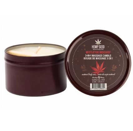Earthly Body Hemp Seed 3-in-1 Massage Candle Mistletoe Mischief 6 Oz in burgundy container with lid.
