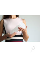 Kiiroo Titan Power Stroker Sleeve Clear held by a woman, showcasing its design and texture for enhanced performance.