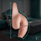 Strap U Uncut Packer Silicone 5.1 inches Dildo Vanilla size dimensions on a bed background.