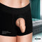 Strap U Uncut Packer Silicone 5.1 inches Dildo Vanilla featured in black boxer shorts.