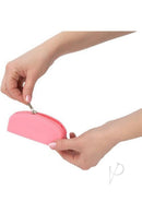 PowerBullet Silicone Storage Bag with Zipper Pink being held with a zipper partially opened.
