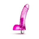 Naturally Yours Vibrating Ding Dong 6.5 Inch Dildo Pink displayed on a white background, showcasing its realistic design and removable bullet.