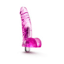 Naturally Yours Vibrating Ding Dong 6.5 Inch Dildo Pink on a white background, showcasing its realistic shape and texture.
