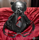 Master Series BDSM Bear Backpack Black featuring plush black bear design with bondage gear and zippered back pocket.