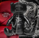 Master Series BDSM Bear Backpack Black showcasing a plush bear in bondage gear with a contrasting background.