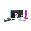 b-Vibe Novice Remote-Controlled Vibrating Anal Plug Fuchsia with remote, USB charger, and storage pouch on display.