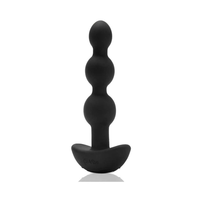 b-Vibe Triplet Remote Controlled Anal Beads Plug Black standing upright on a reflective surface.