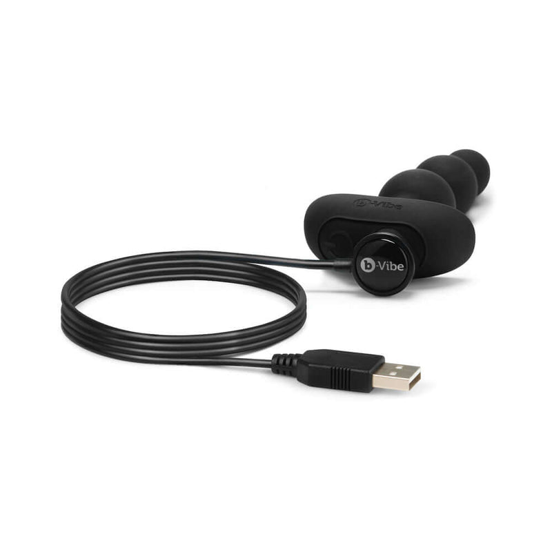 b-Vibe Triplet Remote Controlled Anal Beads Plug Black with USB charging cable for versatile pleasure.