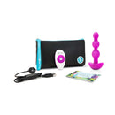 b-Vibe Triplet Remote Controlled Anal Beads Plug Fuchsia with remote, charging cable, and travel pouch.