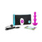 b-Vibe Triplet Remote Controlled Anal Beads Plug Fuchsia with remote, charging cable, and travel pouch.