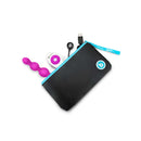 b-Vibe Triplet Remote Controlled Anal Beads Plug Fuchsia with remote and charging cable in a sleek black pouch.