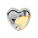 Earthly Body Hemp Seed Edible Massage Candle Pineapple 4 Oz in a heart-shaped container with pineapple.