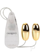 Pocket Exotics Vibrating Double Gold Bullets Wired Remote with dual compact massagers and controller.