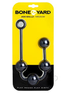 Boneyard Ass Ballz Silicone Anal Beads Medium Black packaging with yellow background and clear display.