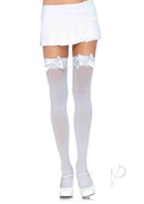 Leg Avenue Nylon Thigh High Stockings with Bow White displayed on model, featuring bow detail and a stylish skirt.