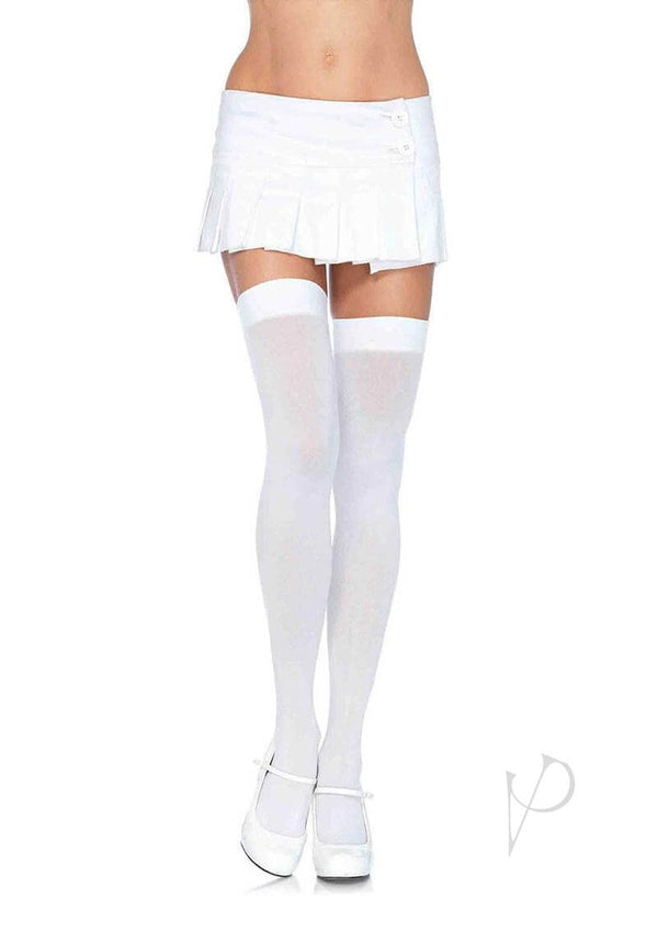 Model wearing Leg Avenue Plus Size White Nylon Thigh Highs with a short pleated skirt and heels.
