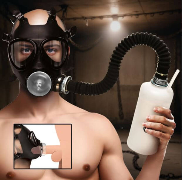Master Series Overload Stroker Gas Mask Kit displayed with a male model wearing the gas mask and holding a bottle.