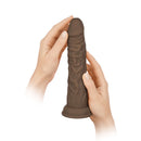 FemmeFunn Vortex Turbo Shaft 2.0 8 inch Vibrating Rotating Dildo Brown held in hands.