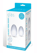 Glas Yoni Eggs 2 Piece Kegel Exerciser Set Clear packaging displaying two glass eggs designed for pelvic floor exercise.