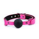 NS Novelties Electra Ball Gag Pink with a black ball and soft pink strap, perfect for playful restraint.