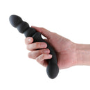 Hand holding Renegade Duel Dual Ended Anal Vibrator Black with curved and beaded ends.
