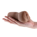 Hustler's Barely Legal Raven Stroker Brown held in a hand, showcasing its realistic texture and compact design.