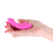 Techno Lucy App Controlled Magnetic Panty Vibe Magenta held in a hand, showcasing its sleek design and vibrant color.