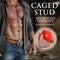 Master Series Bull Chastity Cage Red displayed with muscular man, emphasizing dominance and submission.