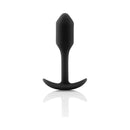 b-Vibe Snug Plug 1 Weighted Silicone Anal Plug Black displayed on a reflective surface.