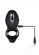 Mr Flicker Rechargeable Silicone Cock Ring Black connected to USB for charging, featuring dual rings for enhanced stimulation.