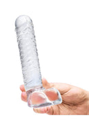 Glas 8 Inch Ribbed Glass G-Spot Dildo with Balls Clear held in hand, showcasing its ribbed design and realistic balls.