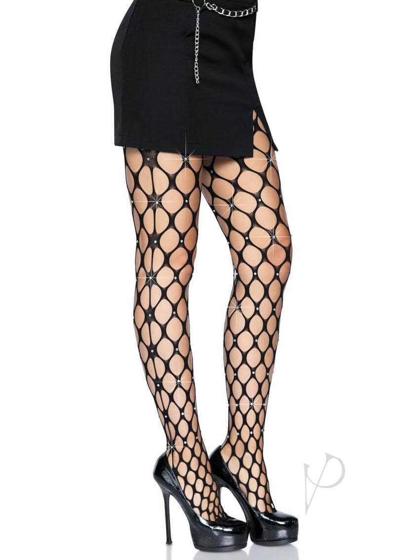 Leg Avenue Rhinestone Jumbo Pothole Net Tights in black worn with a short skirt and heels, showcasing a stylish look.