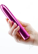 Chroma Classic Rechargeable Vibrator 7 Inch Pink held in a hand, showcasing its sleek design and vibrant color.