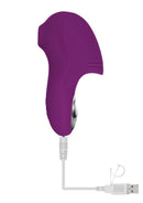 Evolved Sucker For You Silicone Clitoral Stimulator Purple charging with USB connection.