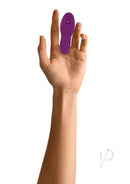 Evolved Sucker For You Silicone Clitoral Stimulator Purple held in a hand, showcasing its compact design.