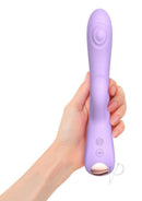 Bunny and Clyde Silicone Rabbit Vibrator Viva Mauve held in hand, showcasing its elegant design and tapping technology.