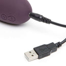 Charging the Fifty Shades Freed Come to Bed Slimline Rabbit Vibrator with USB cable.