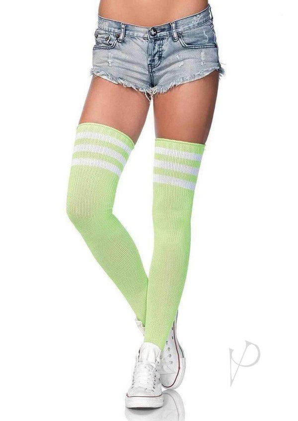 Leg Avenue Athlete Thigh Hi with 3 stripe top in vibrant green, styled with denim shorts and white sneakers.