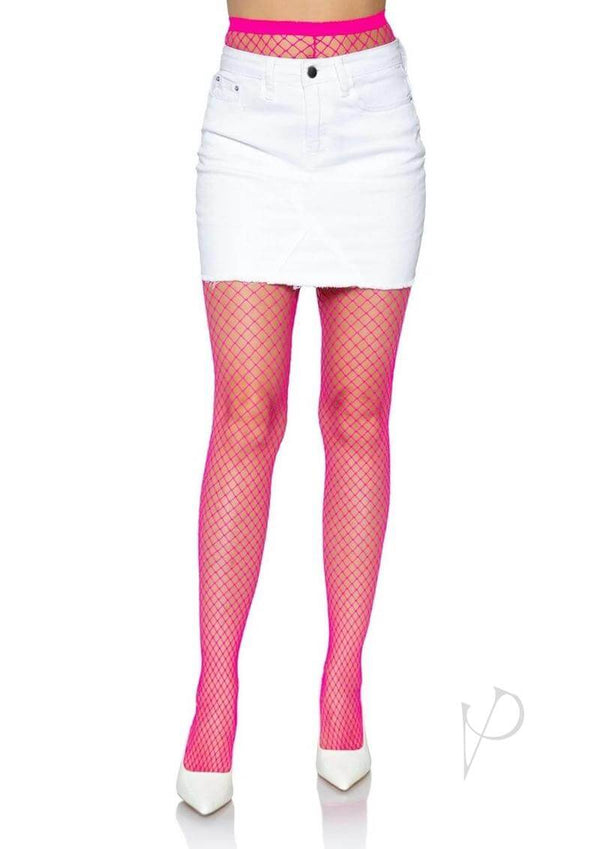 Model wearing neon pink fishnet tights with a white mini skirt and heels, showcasing a bold and edgy fashion look.