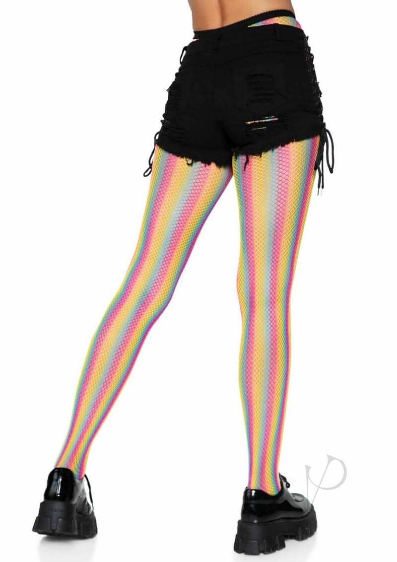 Model wearing Leg Avenue Neon Rainbow Striped Fishnet Pantyhose with black shorts and chunky shoes from the back.