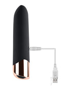 Gender X Gold Standard Silicone Bullet Black Rose Gold with slanted tip and USB charging cable.