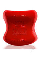 Oxballs Mega Squeeze Ergofit Ballstretcher Red showcasing its ergonomic, hourglass design and vibrant red color.