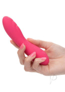 Liquid Silicone Pixies Ripple Rechargeable Vibrator Pink held in a hand for focused pleasure.